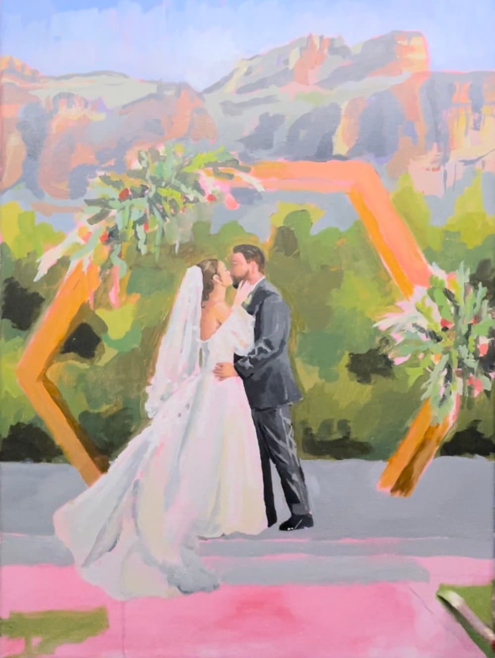 Night of the wedding — painting in progress on easel at venue